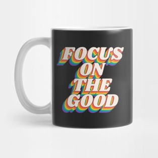 Focus on the Good in Black Red Orange Green and Blue Mug